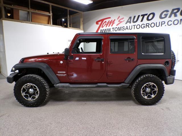 used 2010 Jeep Wrangler Unlimited car, priced at $13,995