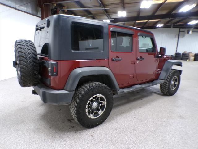 used 2010 Jeep Wrangler Unlimited car, priced at $13,995