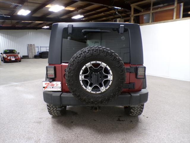 used 2010 Jeep Wrangler Unlimited car, priced at $13,995