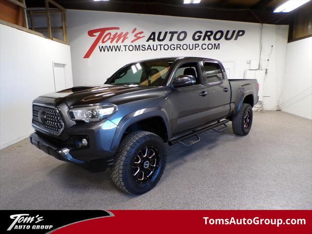 used 2018 Toyota Tacoma car, priced at $23,995