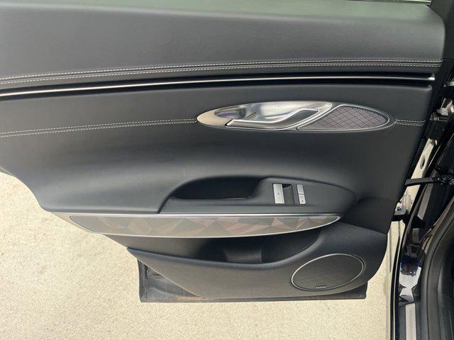 used 2024 Genesis GV70 car, priced at $54,640