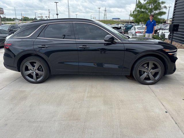 used 2024 Genesis GV70 car, priced at $53,573