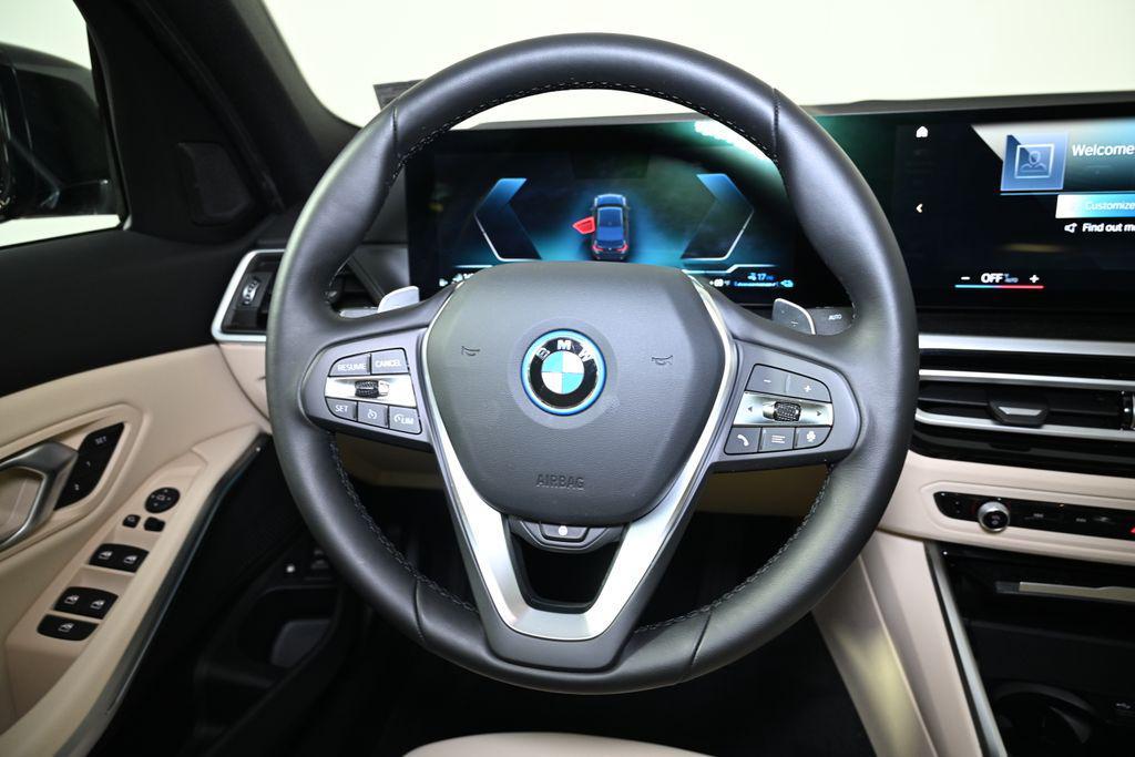 used 2023 BMW 330e car, priced at $37,000