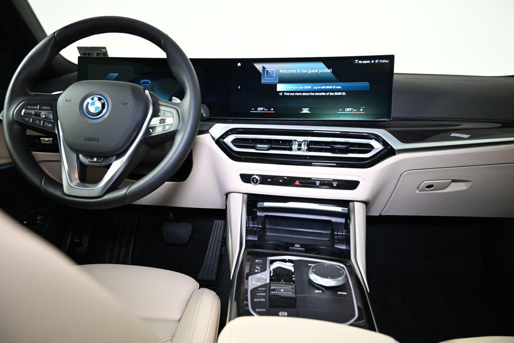used 2023 BMW 330e car, priced at $37,000