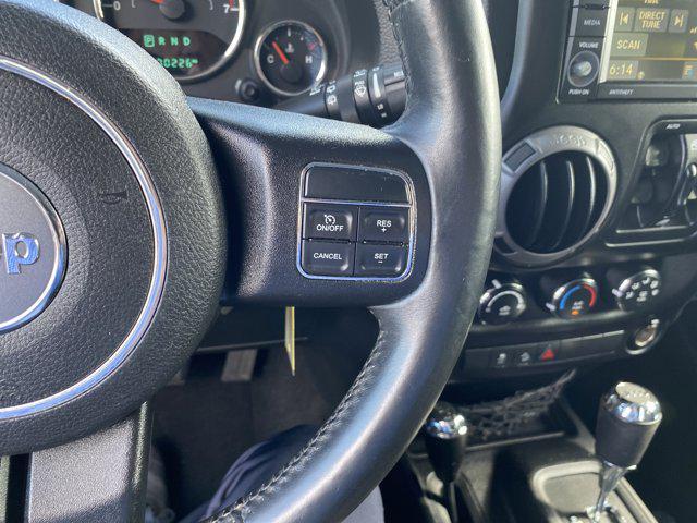 used 2015 Jeep Wrangler Unlimited car, priced at $21,452
