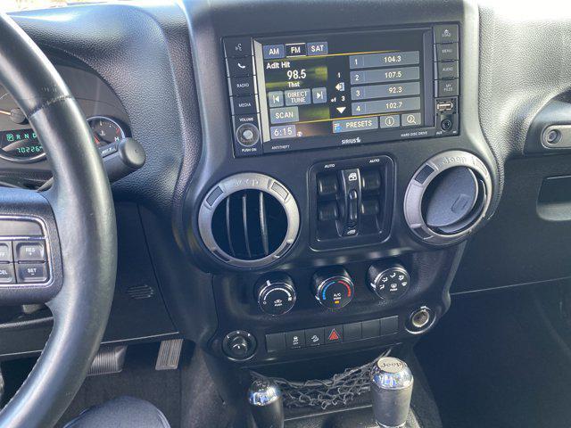used 2015 Jeep Wrangler Unlimited car, priced at $21,452