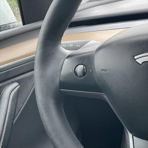 used 2023 Tesla Model Y car, priced at $32,371