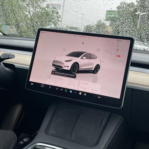 used 2023 Tesla Model Y car, priced at $32,371