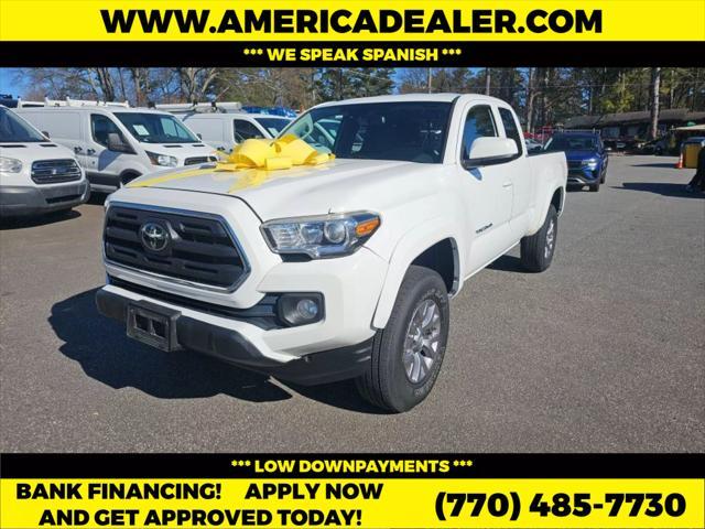 used 2018 Toyota Tacoma car, priced at $13,999