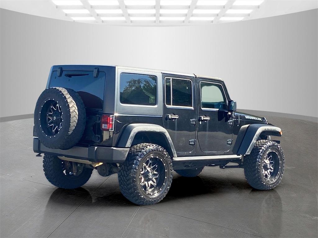 used 2016 Jeep Wrangler Unlimited car, priced at $12,995