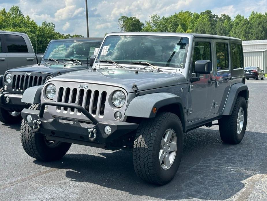 used 2016 Jeep Wrangler Unlimited car, priced at $21,235