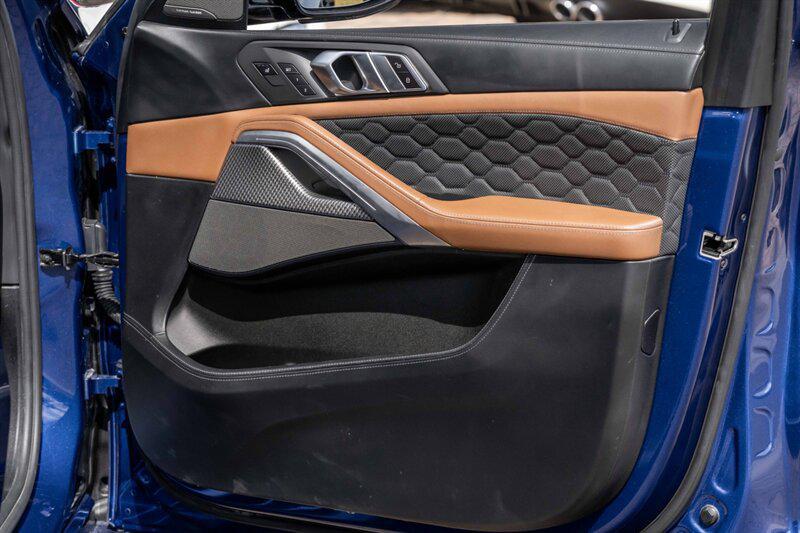 used 2021 BMW X6 M car, priced at $58,950