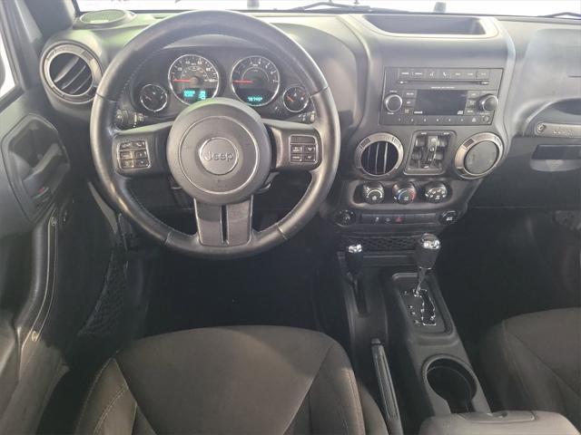 used 2015 Jeep Wrangler Unlimited car, priced at $16,899