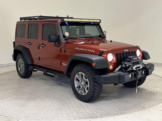 used 2014 Jeep Wrangler Unlimited car, priced at $14,499