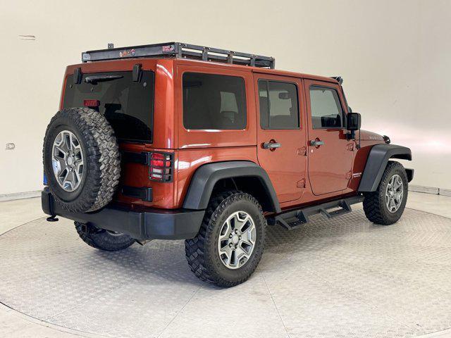 used 2014 Jeep Wrangler Unlimited car, priced at $14,499
