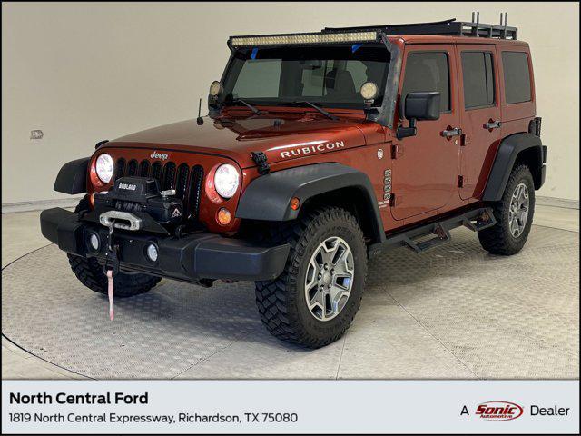 used 2014 Jeep Wrangler Unlimited car, priced at $14,499