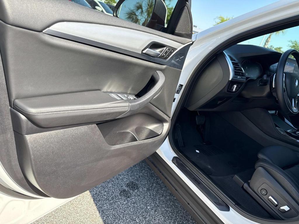 used 2023 BMW X4 car, priced at $44,399