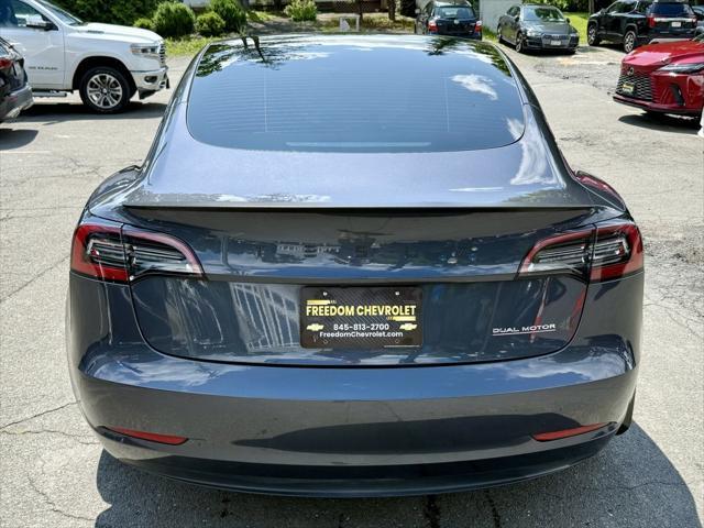 used 2023 Tesla Model 3 car, priced at $26,995