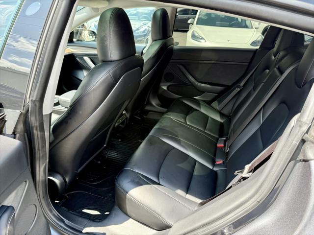 used 2023 Tesla Model 3 car, priced at $26,995
