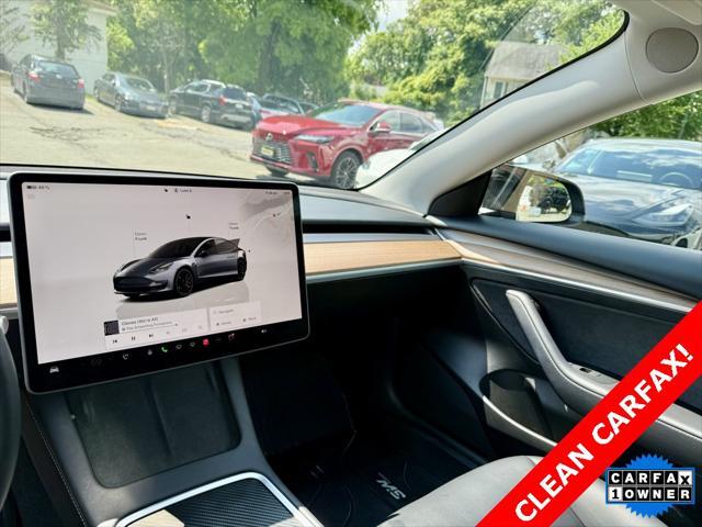 used 2023 Tesla Model 3 car, priced at $26,495