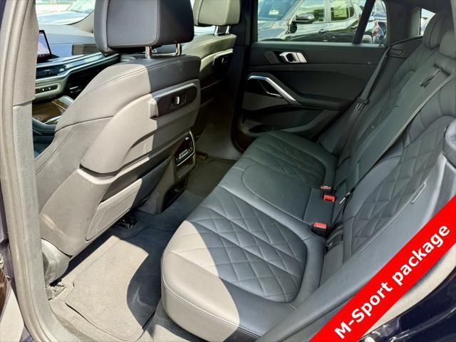 used 2025 BMW X6 car, priced at $56,595