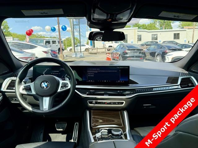 used 2025 BMW X6 car, priced at $56,595