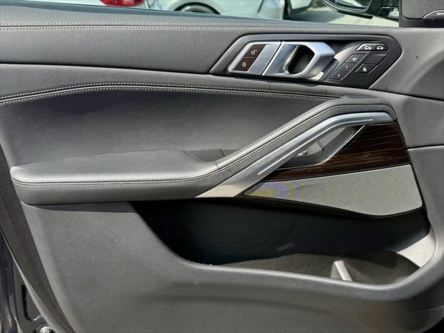 used 2025 BMW X6 car, priced at $59,995
