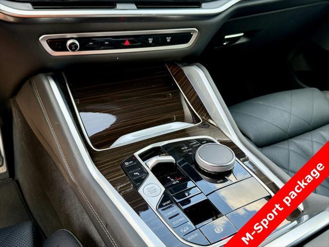 used 2025 BMW X6 car, priced at $56,595