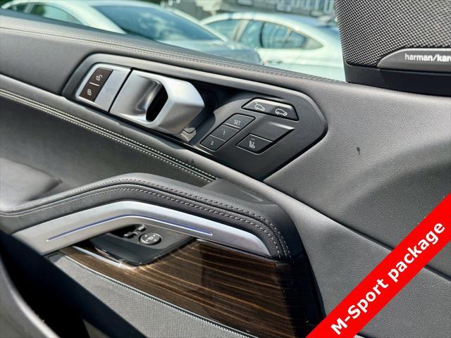 used 2025 BMW X6 car, priced at $56,595