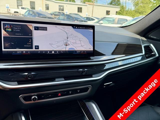 used 2025 BMW X6 car, priced at $56,595