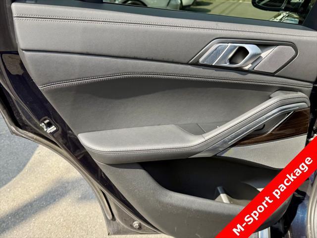 used 2025 BMW X6 car, priced at $56,595