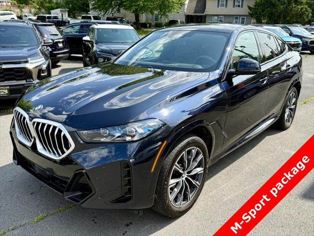 used 2025 BMW X6 car, priced at $57,495