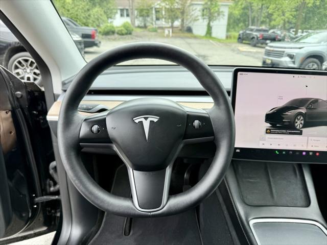 used 2023 Tesla Model Y car, priced at $27,995