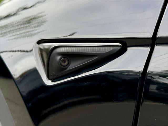 used 2023 Tesla Model Y car, priced at $27,995