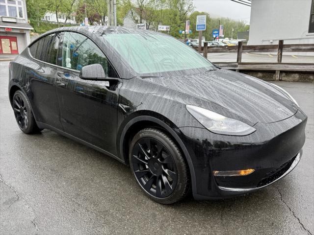 used 2023 Tesla Model Y car, priced at $27,895