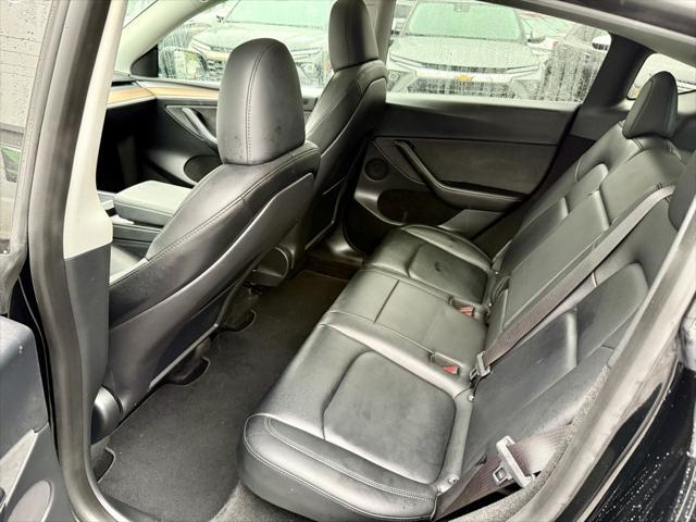 used 2023 Tesla Model Y car, priced at $27,895