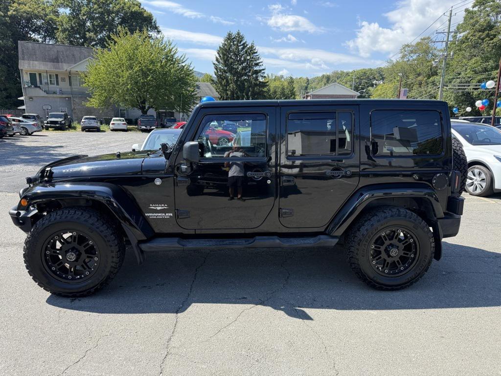 used 2013 Jeep Wrangler Unlimited car, priced at $15,995