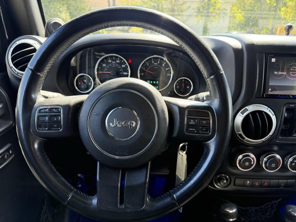 used 2013 Jeep Wrangler Unlimited car, priced at $15,995