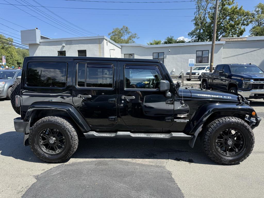 used 2013 Jeep Wrangler Unlimited car, priced at $15,995