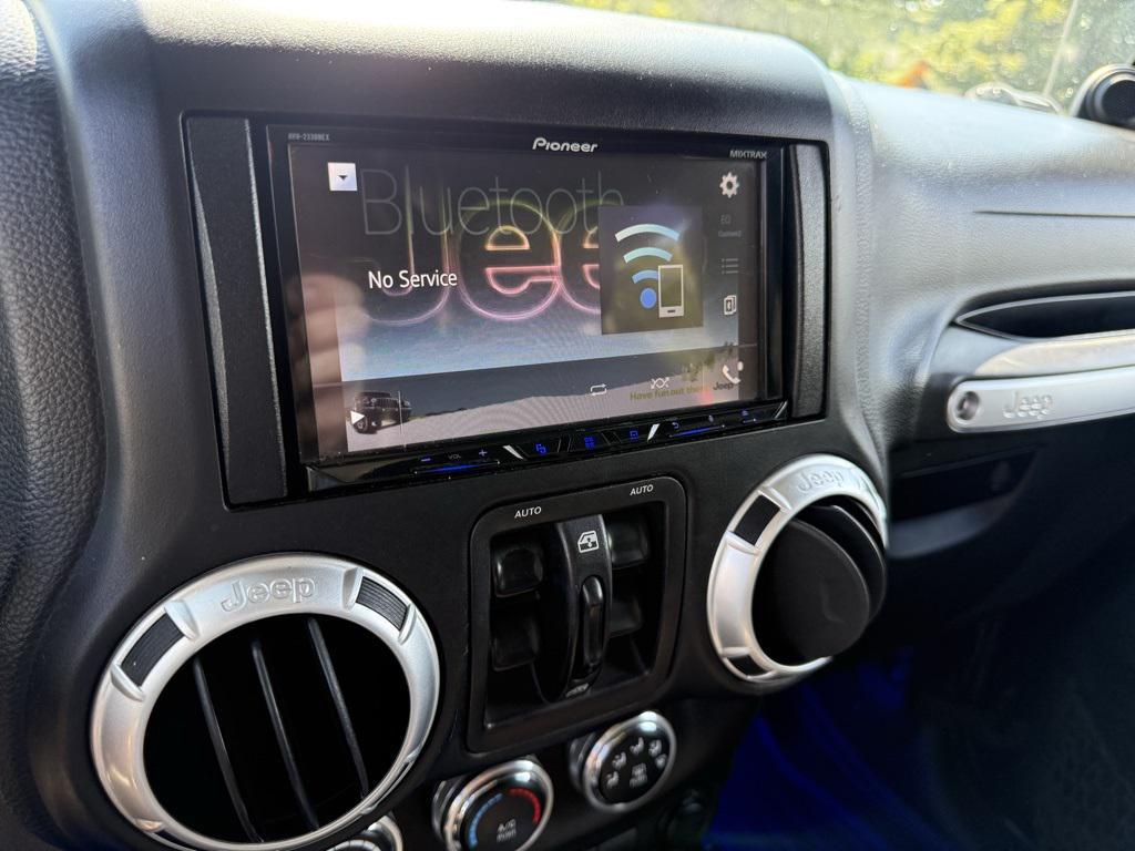 used 2013 Jeep Wrangler Unlimited car, priced at $15,995