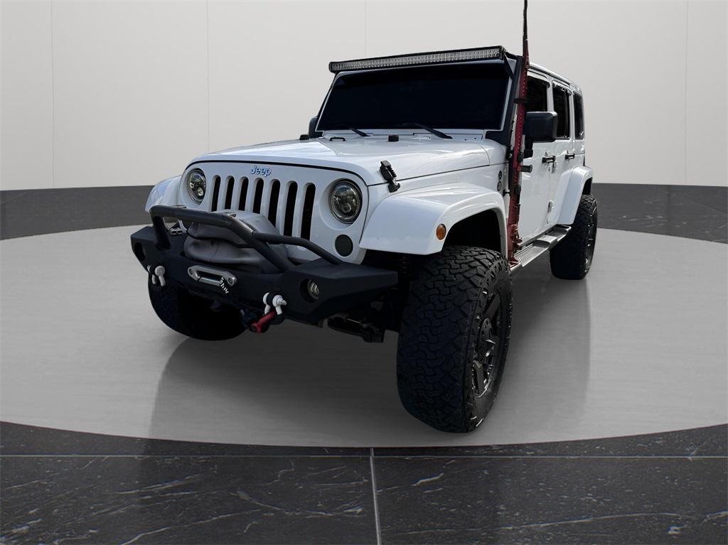 used 2014 Jeep Wrangler Unlimited car, priced at $12,195