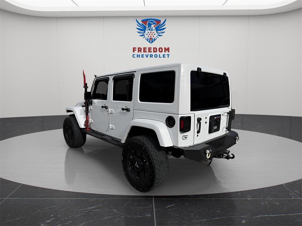 used 2014 Jeep Wrangler Unlimited car, priced at $12,195