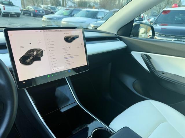 used 2021 Tesla Model Y car, priced at $27,695