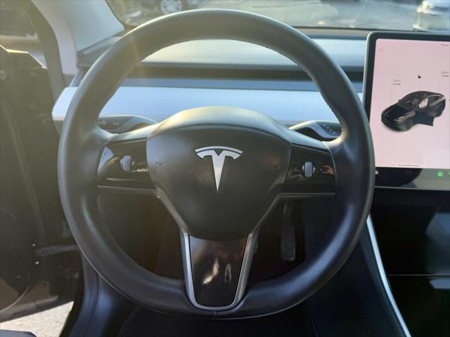 used 2021 Tesla Model Y car, priced at $27,695