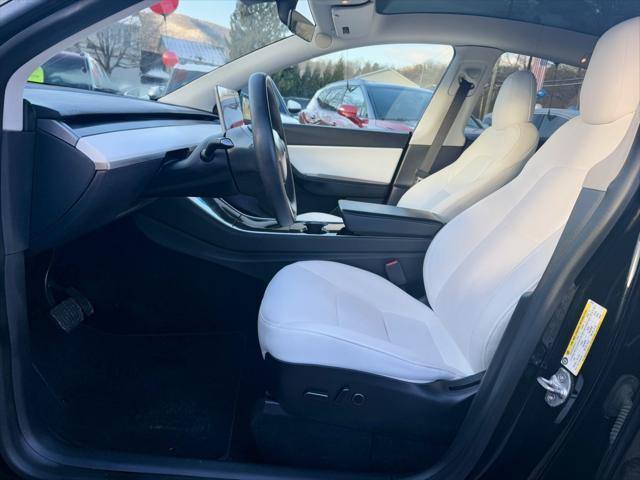 used 2021 Tesla Model Y car, priced at $27,695