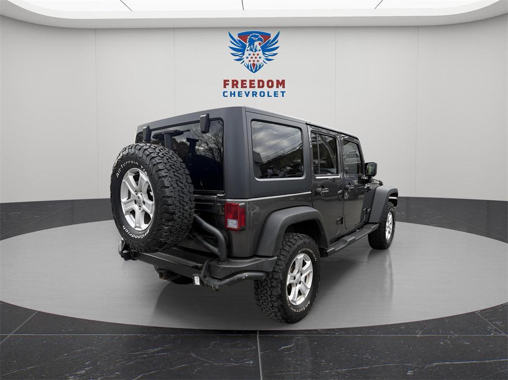 used 2014 Jeep Wrangler Unlimited car, priced at $13,995