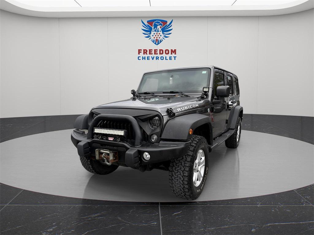 used 2014 Jeep Wrangler Unlimited car, priced at $15,495