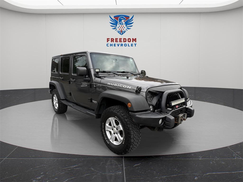 used 2014 Jeep Wrangler Unlimited car, priced at $13,995
