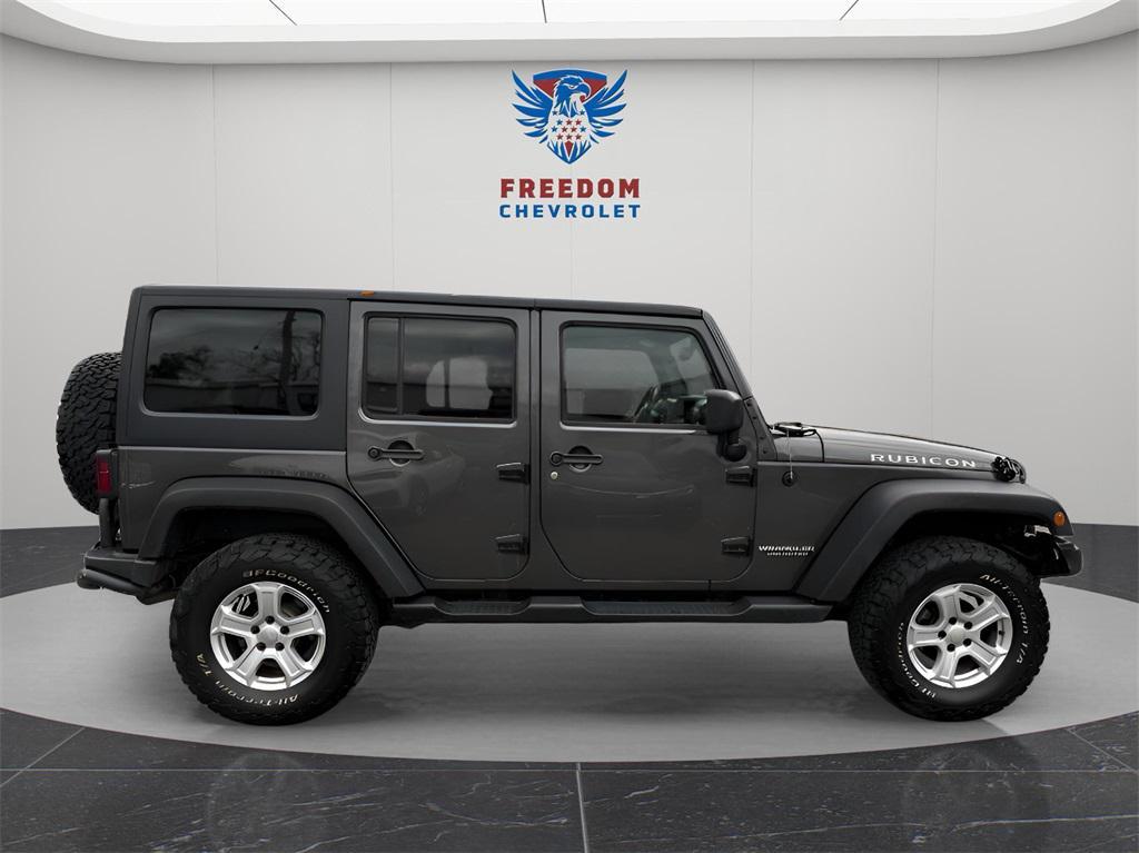 used 2014 Jeep Wrangler Unlimited car, priced at $13,995