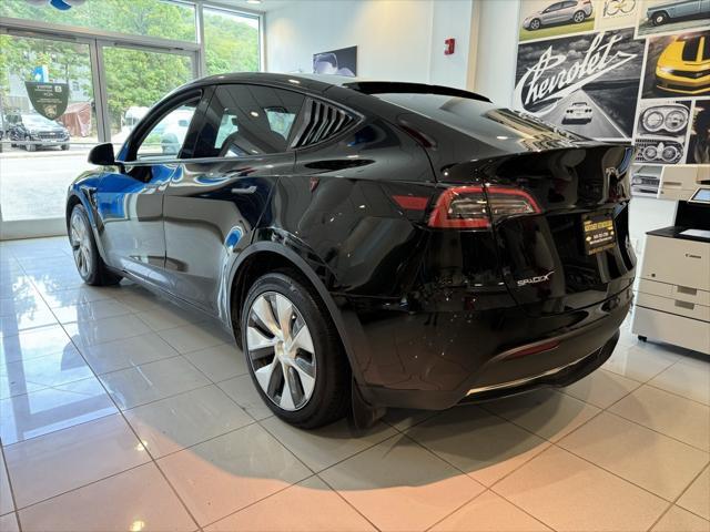 used 2023 Tesla Model Y car, priced at $32,995